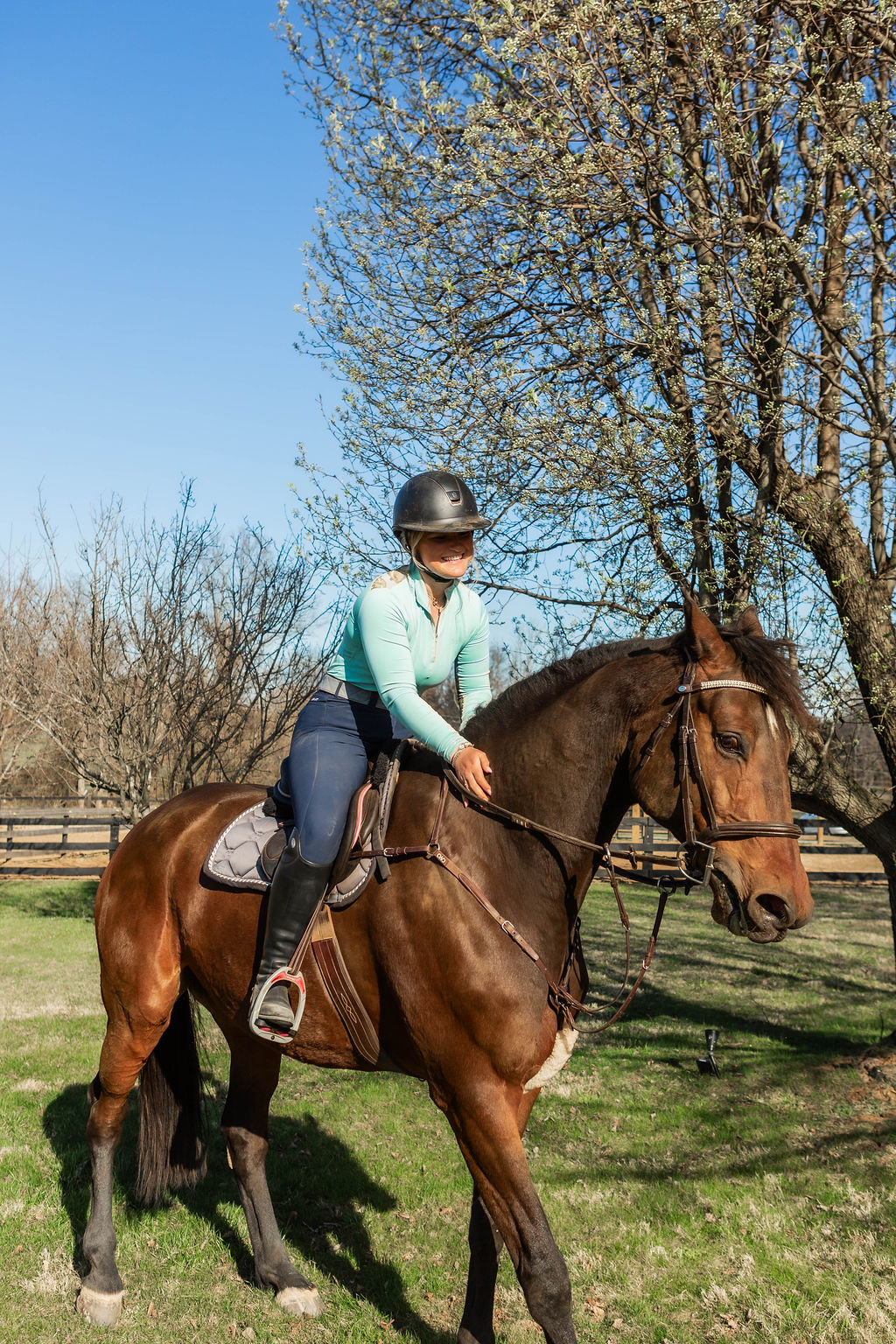 Adult rider on a beautiful chestnut horse at Serene Acres